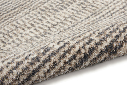 Beige & gray dense cut-pile rug with striped pattern, rolled edge, cozy home decor.