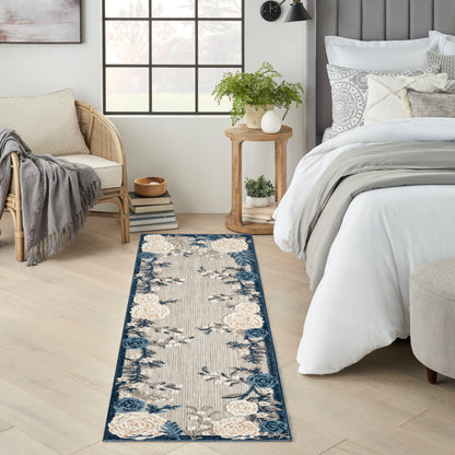 Floral beige outdoor runner rug with a blue border and ivory roses; 6'.