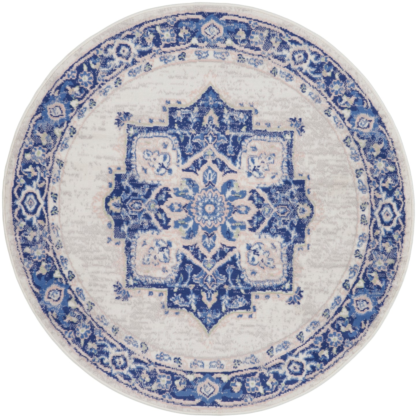 Round blue and white oriental rug with intricate central medallion and ornate floral border.