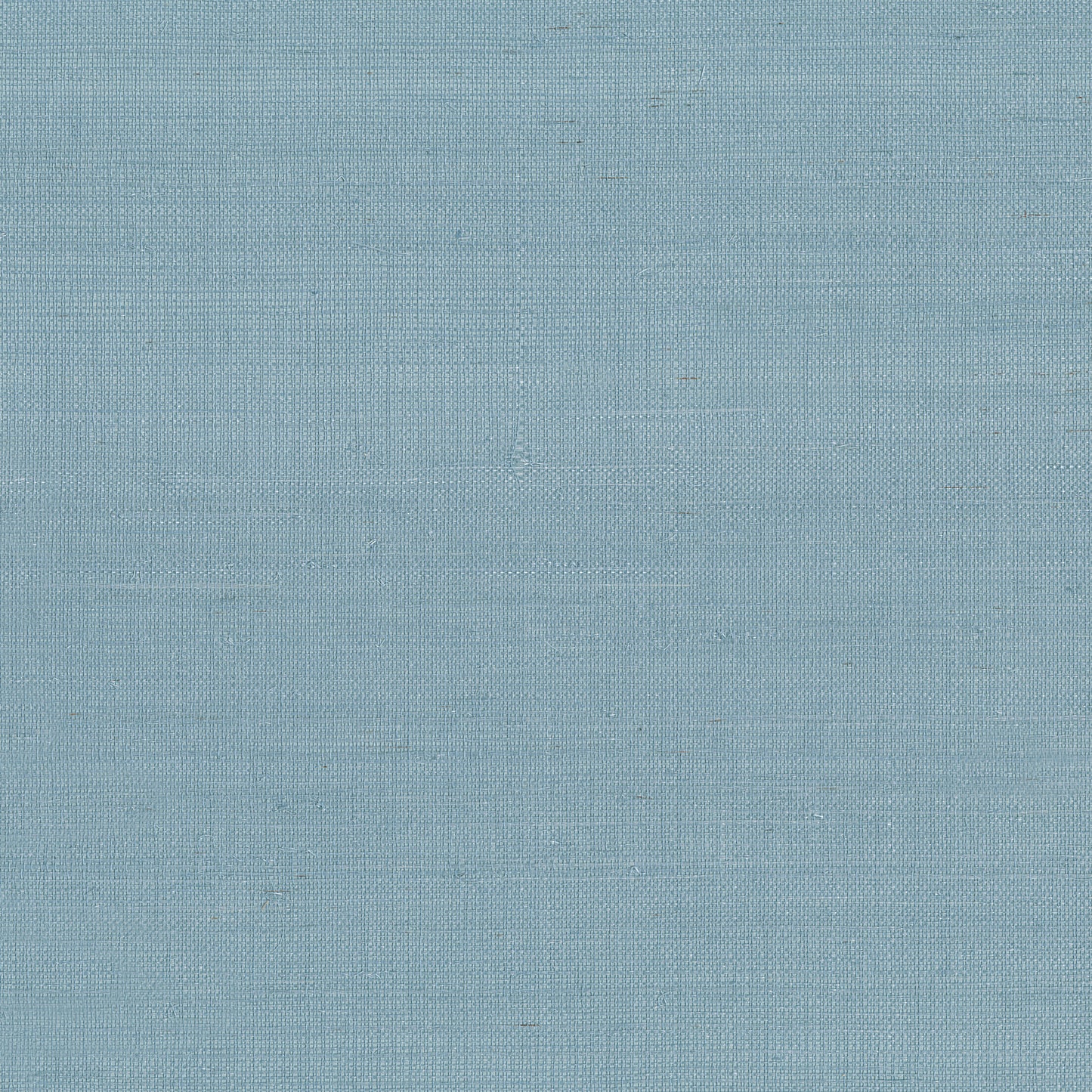 Light blue woven fabric close-up with subtle linen texture and visible warp and weft threads.