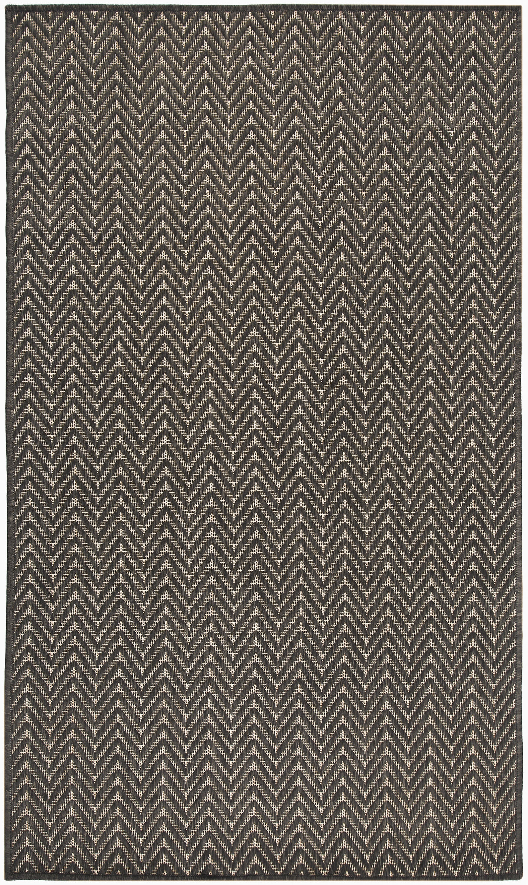 Rectangular woven rug in black & cream with a bold chevron zigzag pattern, textured geometric style.
