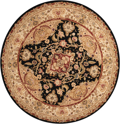 Round Persian-style rug with black center field, ivory-beige floral motifs and a detailed red border.