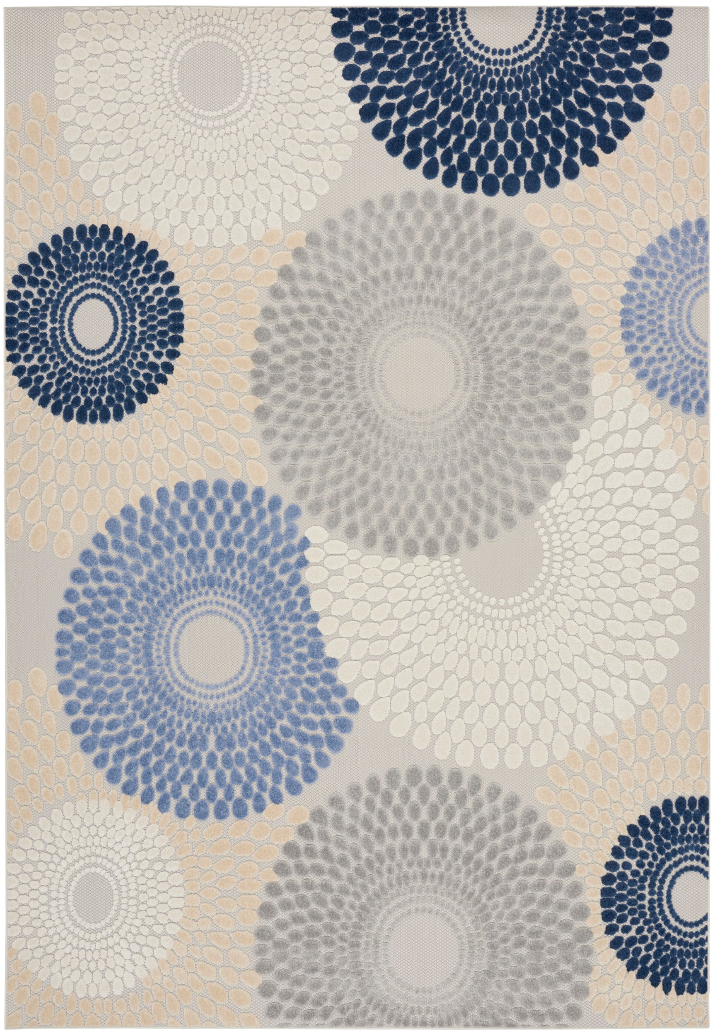 Geometric rug featuring large circular sunburst motifs in navy, blue, gray and beige.