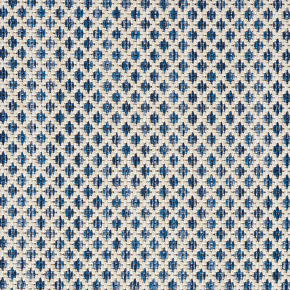 Woven fabric with tiny navy and sky-blue diamond motifs on ivory background; versatile upholstery textile use.
