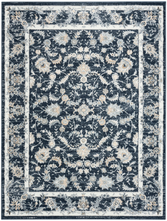 Navy blue area rug with ivory-beige floral vine pattern and layered light borders in a traditional Persian style.
