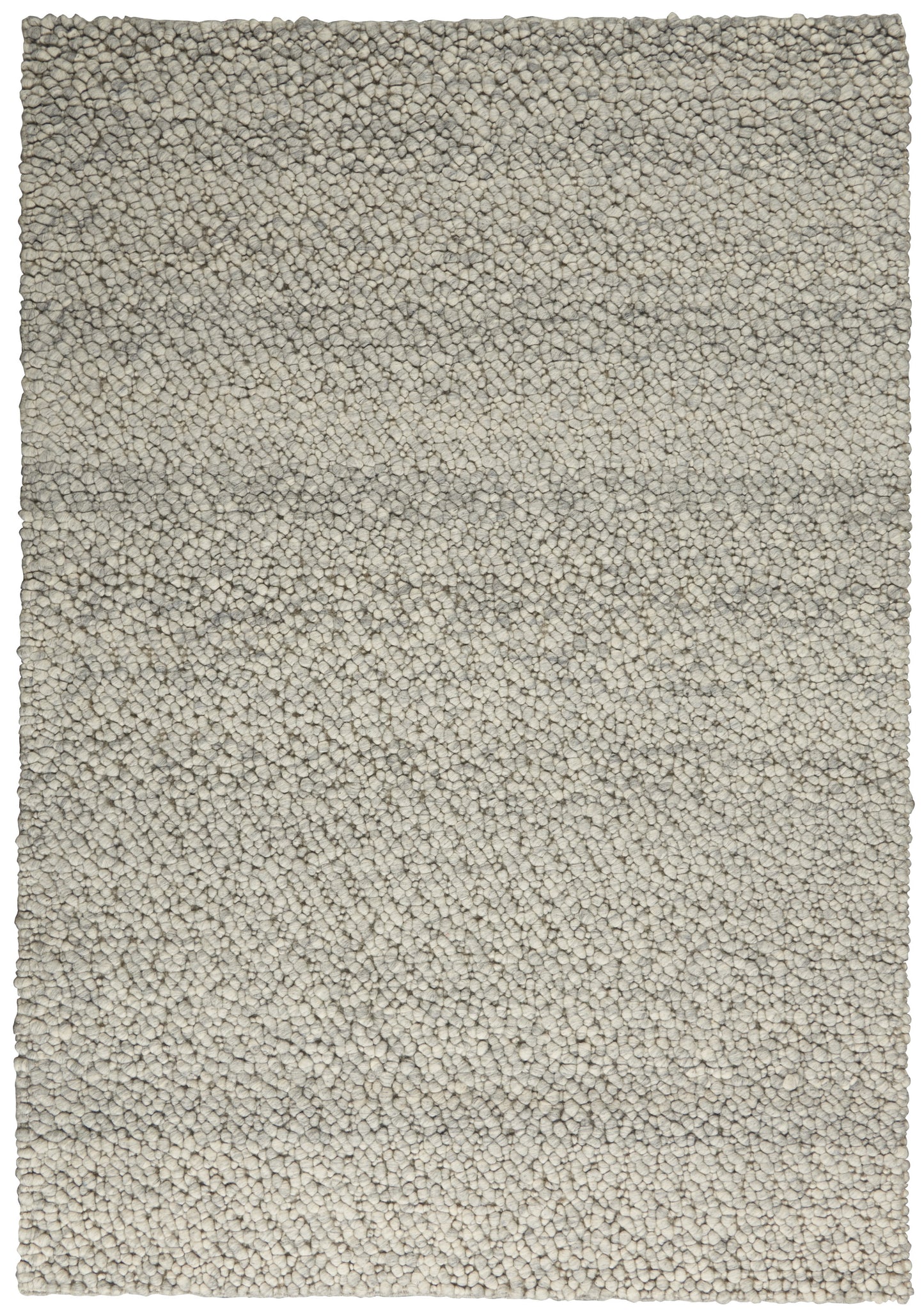 Rectangular light beige shag rug with dense, pebble-like tufted pile and gray undertones.
