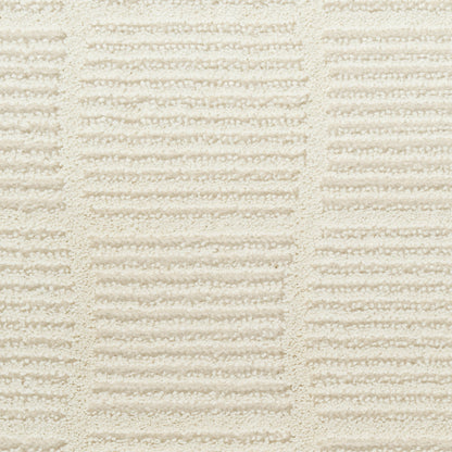 Cream terry towel fabric close-up with alternating raised ridges forming rectangular blocks