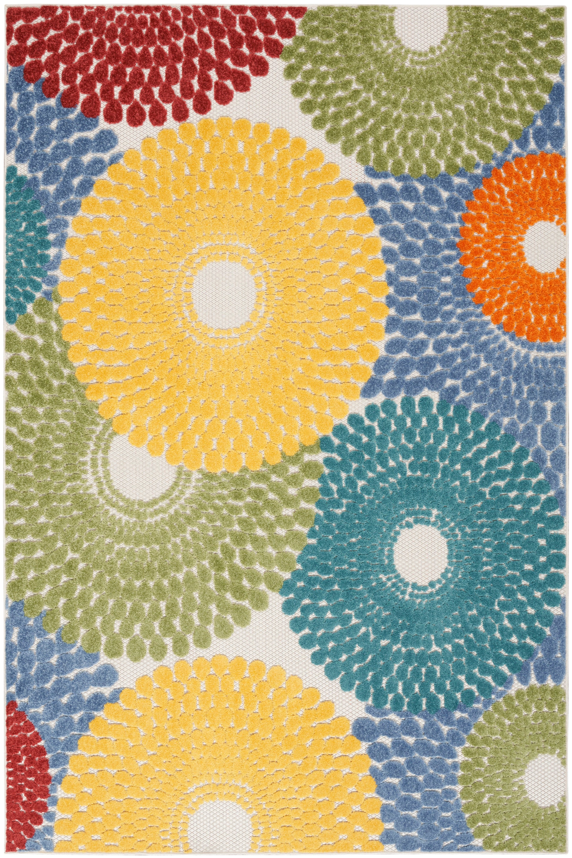 Shaggy circular tufted rug with bright yellow, teal, green, orange and red rings on cream background.