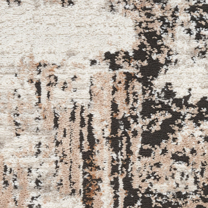 Neutral abstract shag rug in cream, beige, tan & black with irregular blotches and a plush high-pile texture.