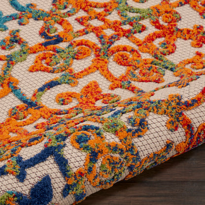 Close-up of a colorful oriental rug with orange, blue, teal and green floral scroll pattern on cream background.