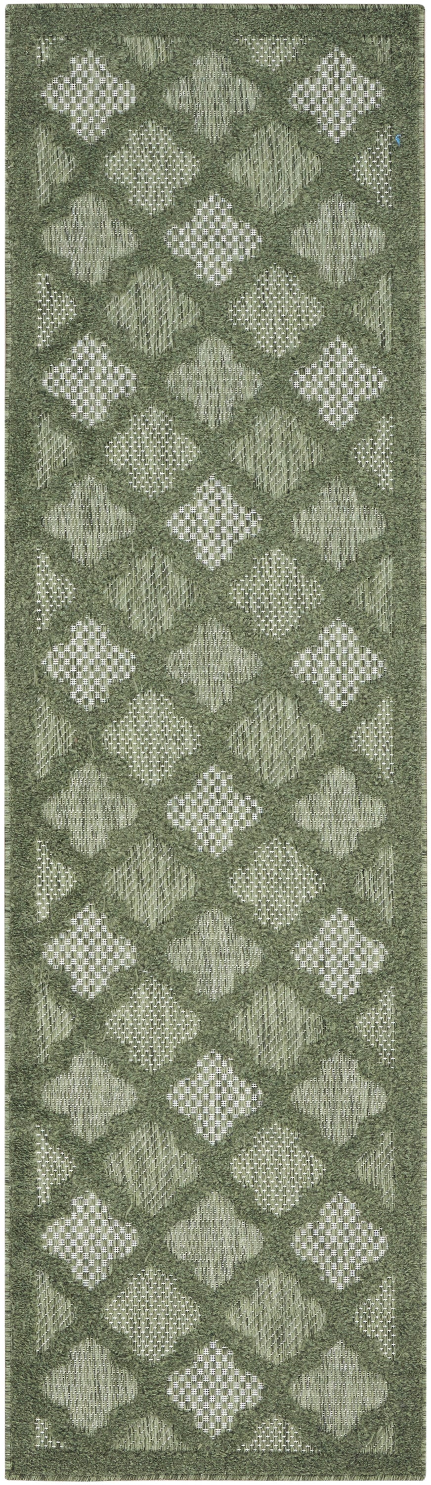 Olive green rug runner with alternating diamond shapes and lattice textures; shaggy border.
