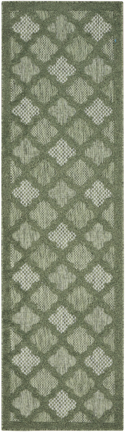 Olive green rug runner with alternating diamond shapes and lattice textures; shaggy border.