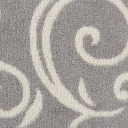 Grey rug with cream swirling scroll pattern, plush textured pile, modern decorative accent for living rooms.