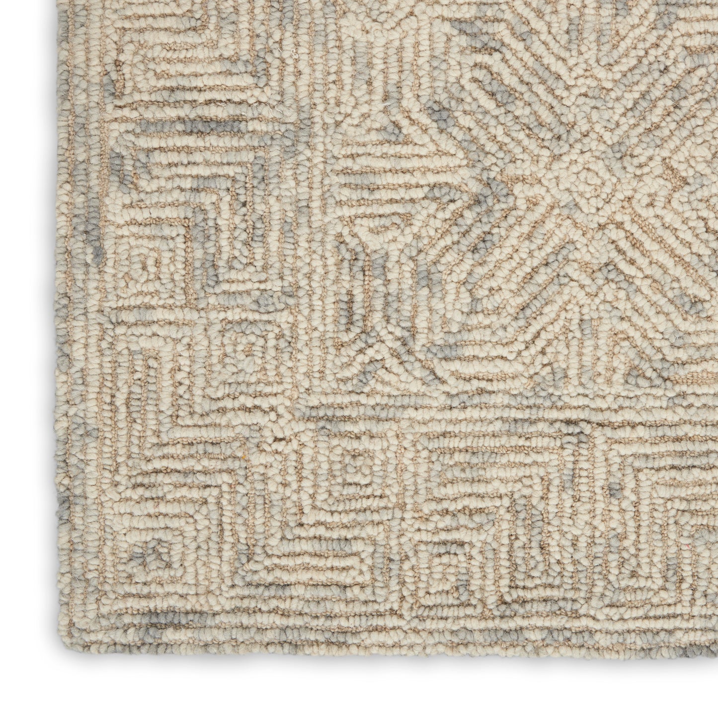 Cream-beige boucle rug with light gray geometric maze pattern and plush textured pile.