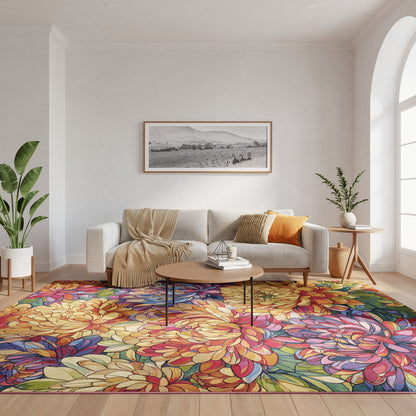 Bright living room with cream sofa, beige throw, orange cushion, round wooden coffee table, and a vivid floral rug; plants and an arched window.