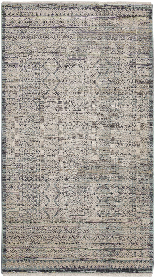 Rectangular distressed geometric rug in muted blues and grays with beige accents; woven tribal pattern for living room.