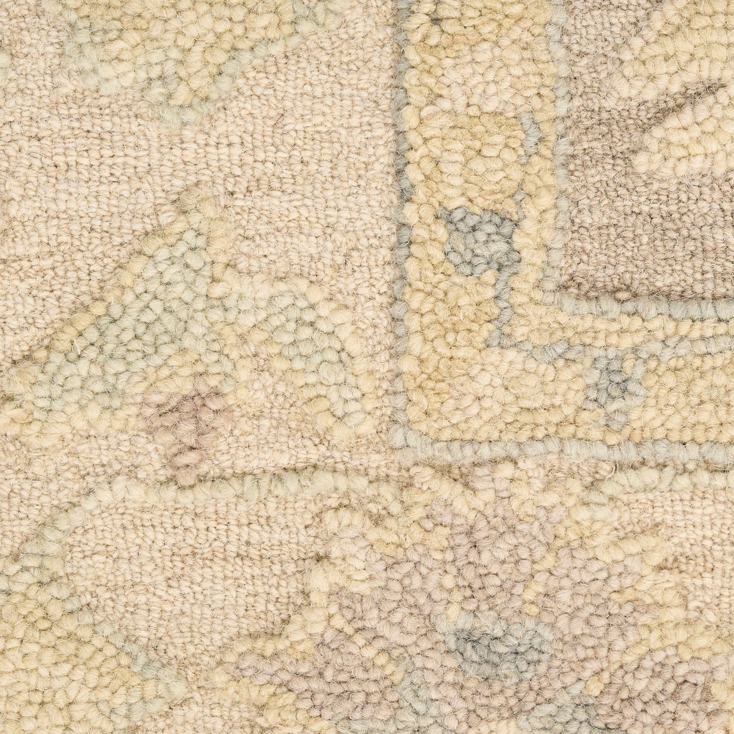 Cream beige textured rug with soft loop pile and subtle geometric pattern in light gray & tan; neutral decor.