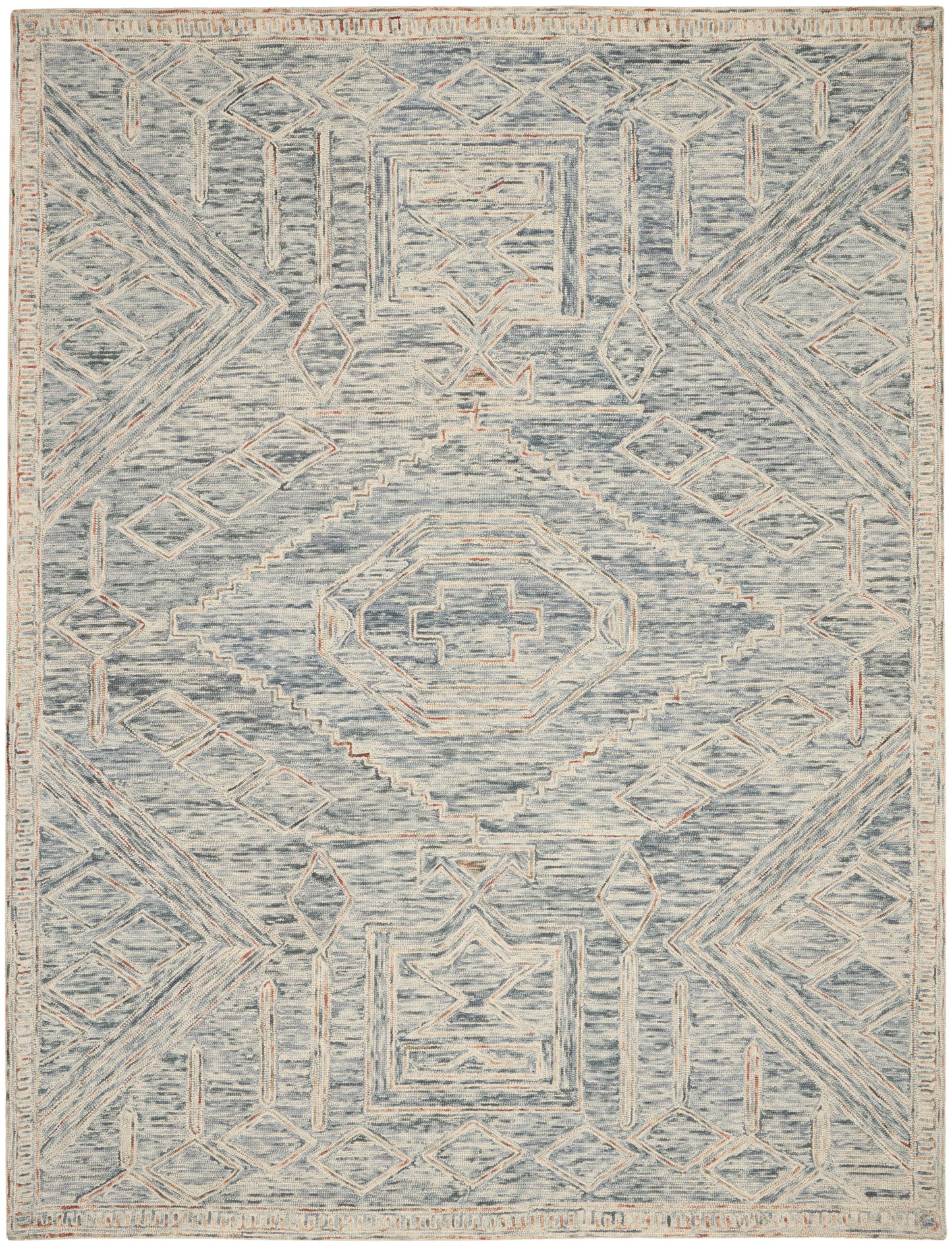 Blue-gray area rug with cream geometric medallions and peach accents in a distressed, vintage-inspired tribal pattern.