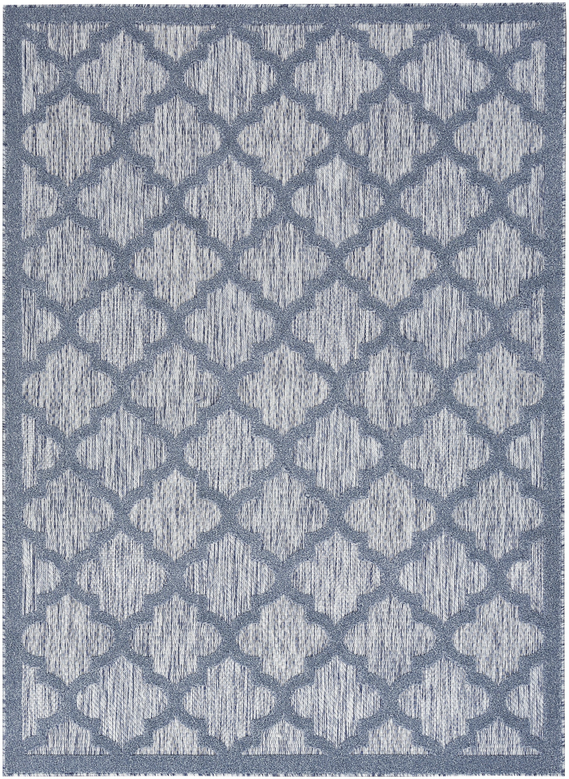 Blue-gray area rug with a repeating diamond lattice pattern, textured weave, and darker border.