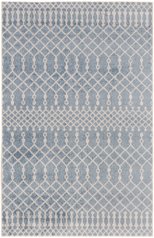 Blue rug with ivory lattice and diamond trellis pattern; distressed finish for contemporary living room decor.