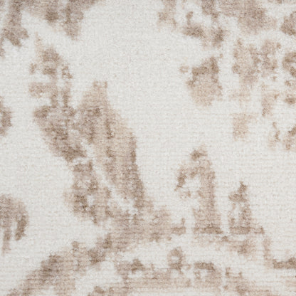 Cream and brown tie-dye textured textile with irregular blotches.