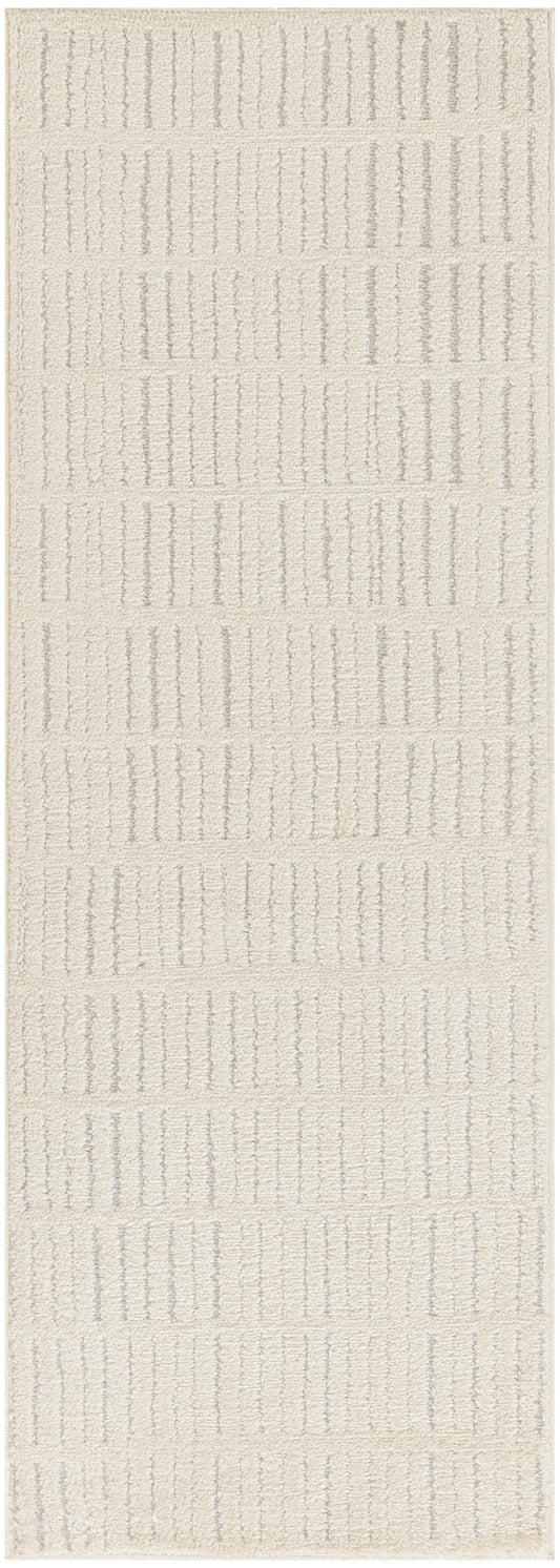 Beige textured area rug with raised vertical stripe motif and soft plush pile