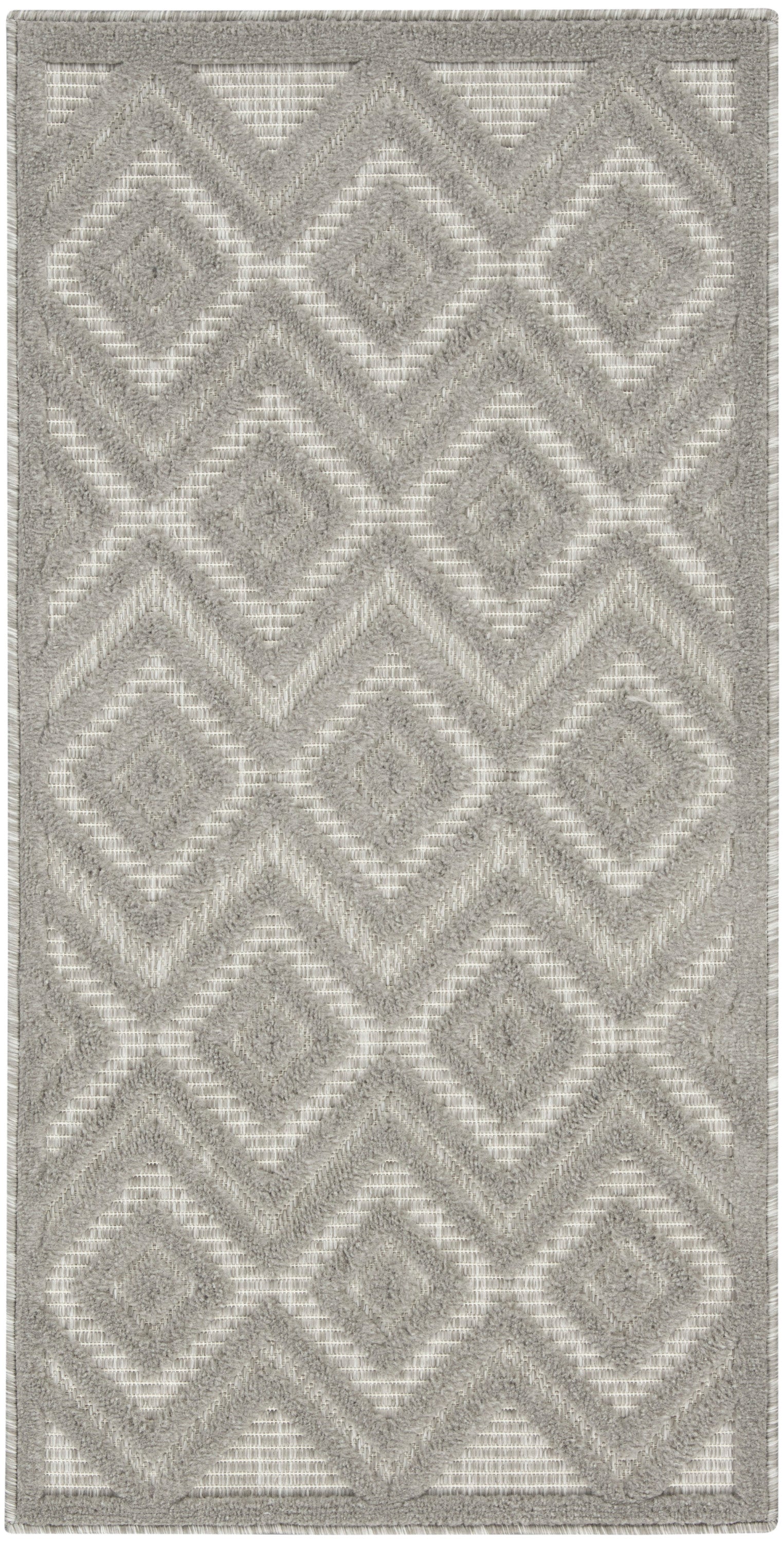 Rectangular gray rug with a two-tone diamond geometric pattern and plush shag pile