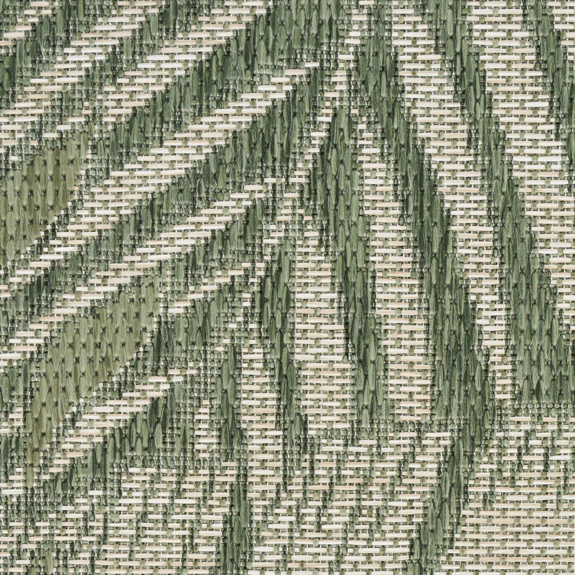 Green geometric outdoor woven rug runner with dark and light green chevrons on a beige background.