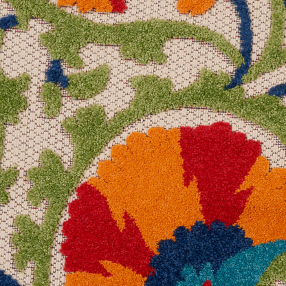 Colorful floral tufted rug with orange, red and blue petals on a beige lattice background, with green leafy vines.