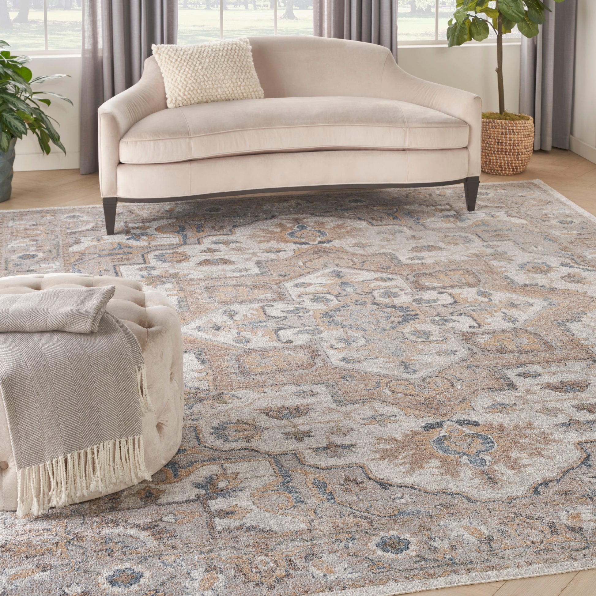 Ornate blue-beige vintage area rug, 8' x 10'.