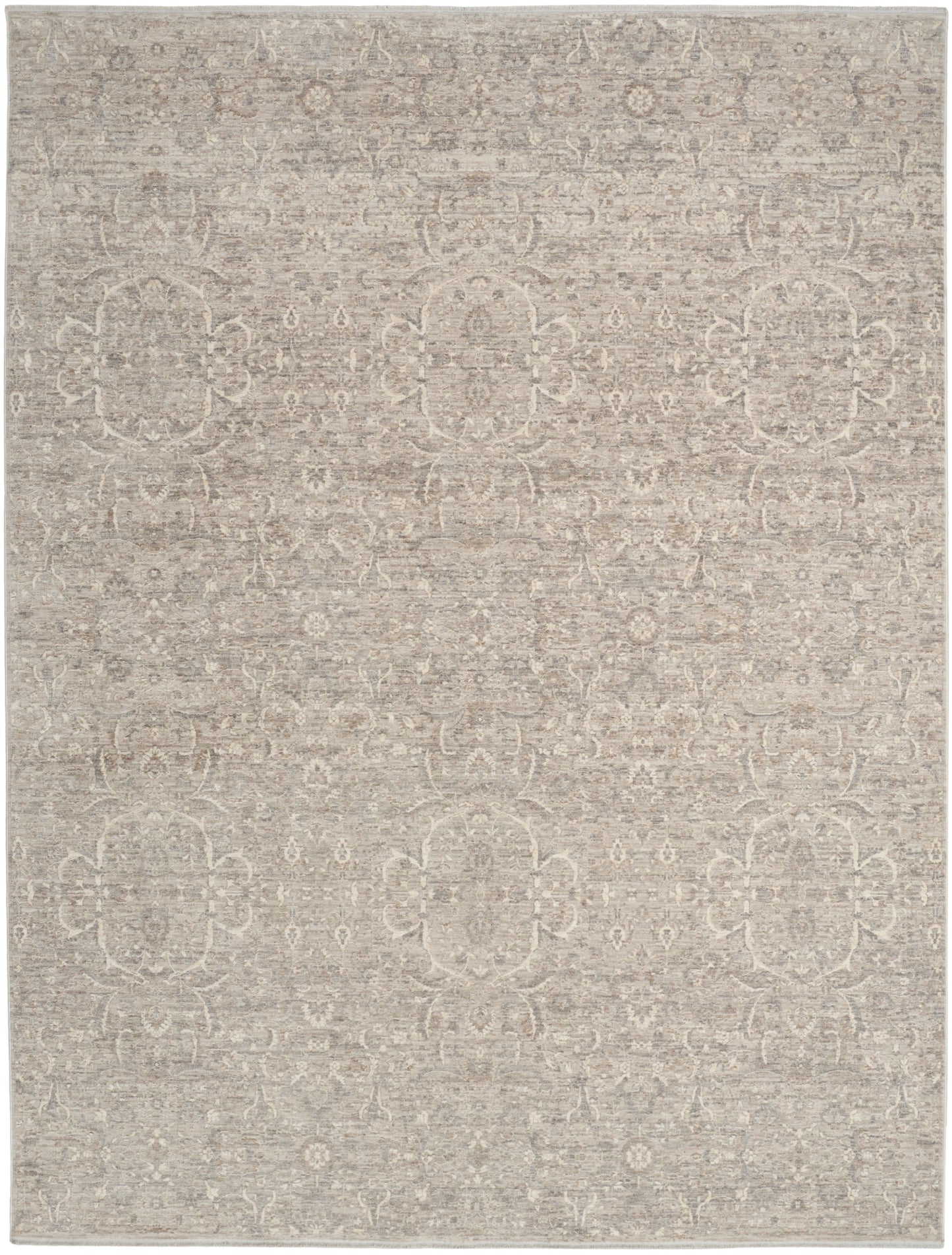 Neutral beige area rug with subtle vintage medallion and floral motifs; soft woven texture.
