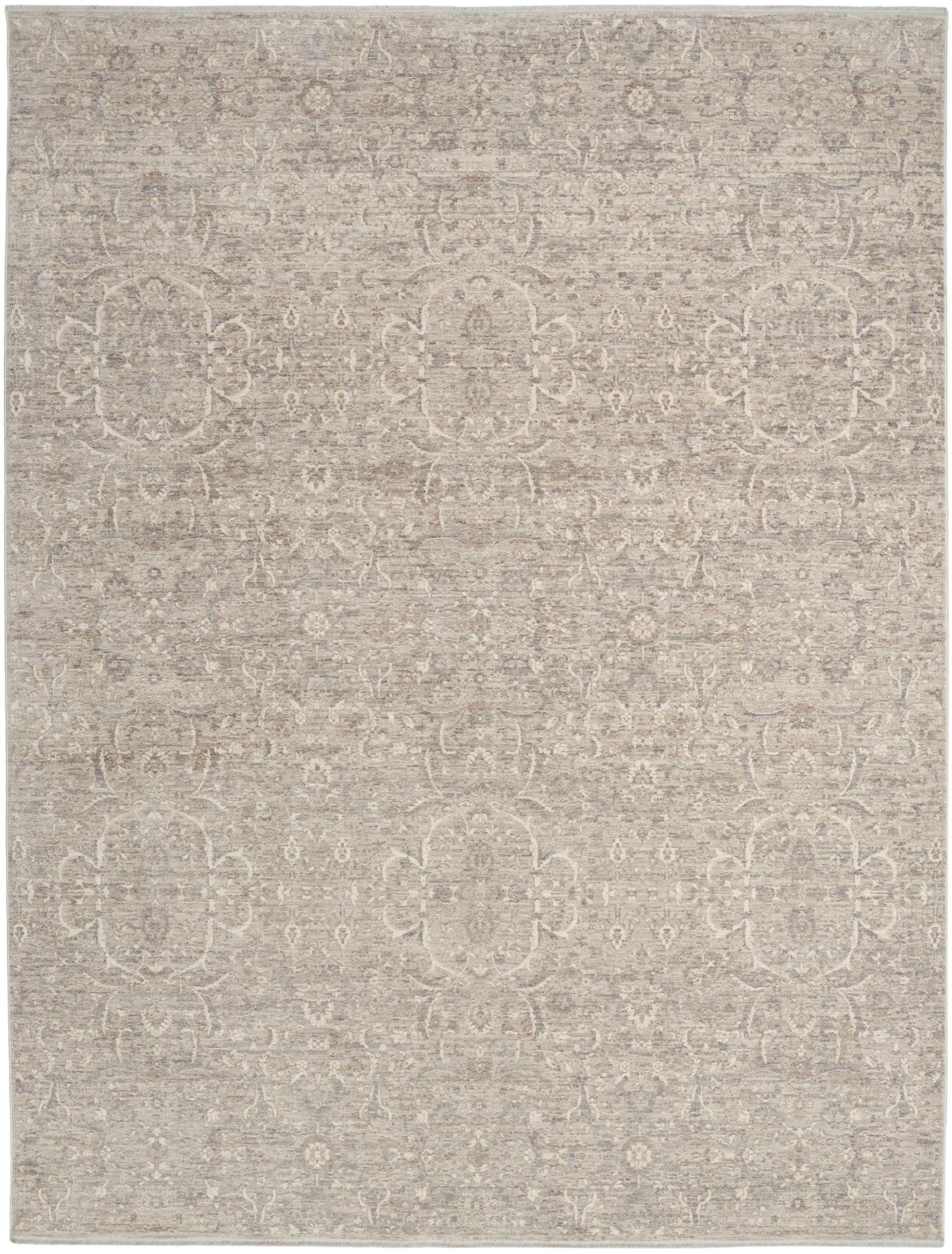 Neutral beige area rug with subtle vintage medallion and floral motifs; soft woven texture.