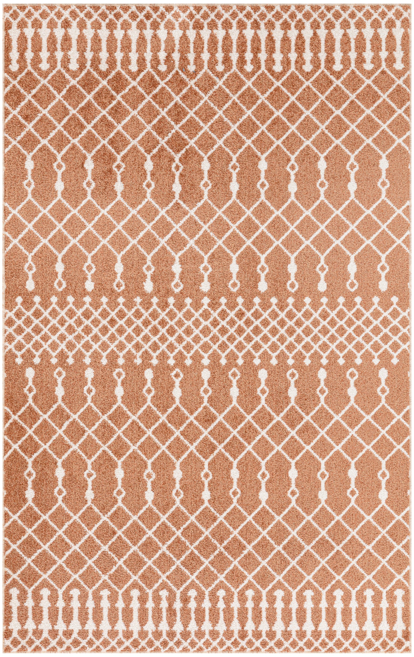 Terracotta-orange rug with white geometric lattice, tassel-border motif, rectangular decorative floor rug.