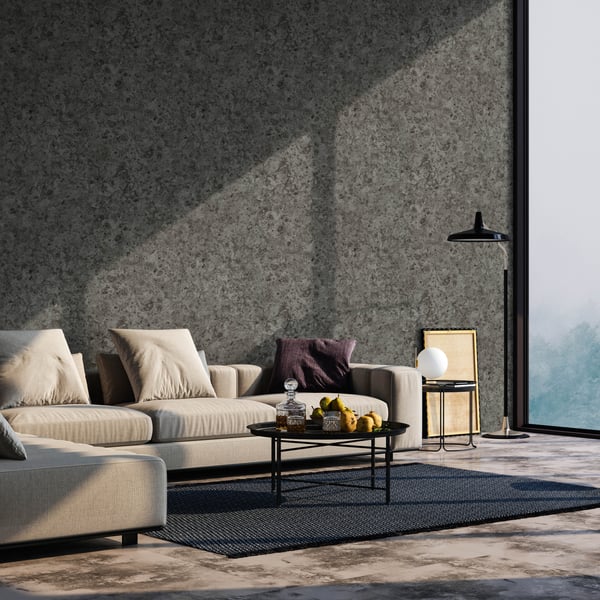 Black igneous rock texture wallpaper with a rugged, natural pattern.