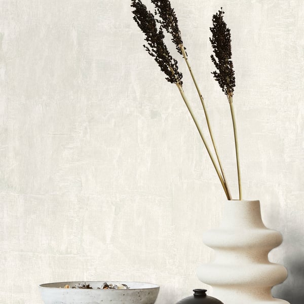 White wallcovering with a subtle ribbed texture on a light background.