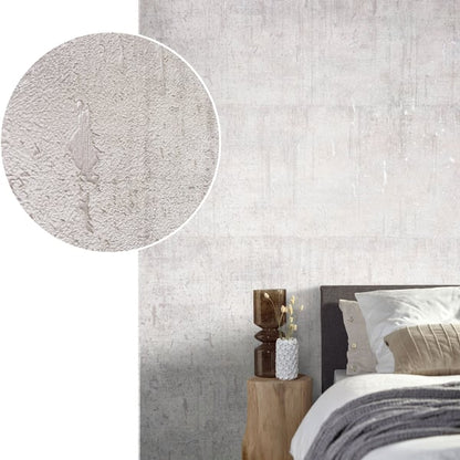 Concrete gray wall wallpaper with a rough plaster finish.