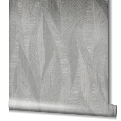 Silver-gray metallic wallpaper roll with geometric leaf pattern, brushed texture and rolled edge for contemporary home decor.