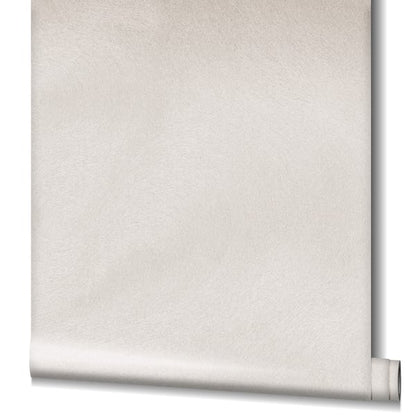 Beige suede-textured wallpaper panel with a subtle rolled edge at bottom.