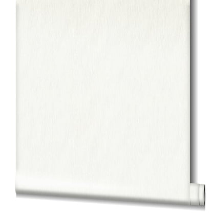 White textured wallpaper with a subtle pattern.