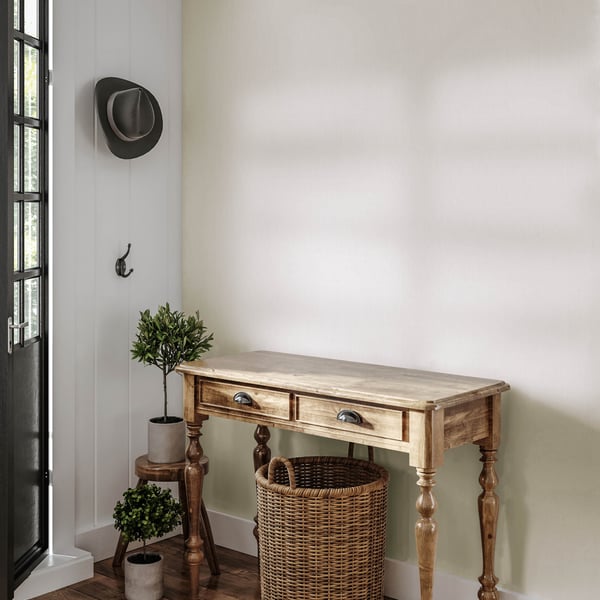 White textured wallpaper with a subtle linen pattern.