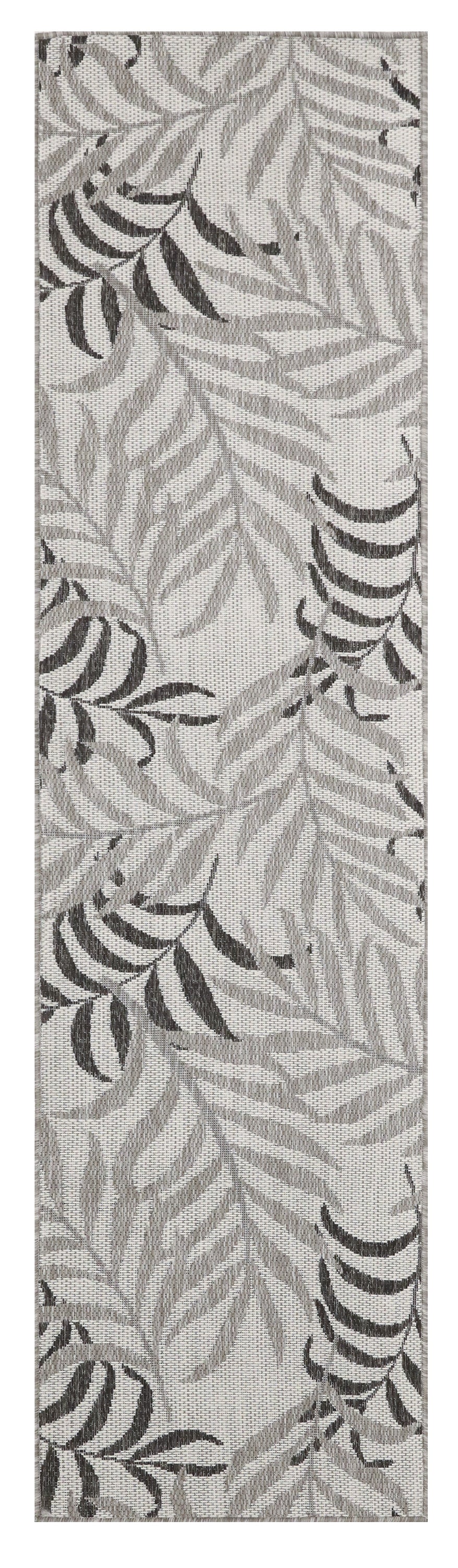 Gray fern leaf rug runner with overlapping monochrome leaves; rectangular textile suitable for hallways or living rooms.