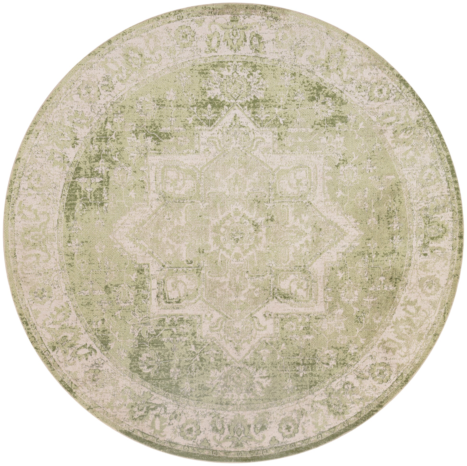 Round distressed oriental rug in beige and sage green with a vintage medallion pattern
