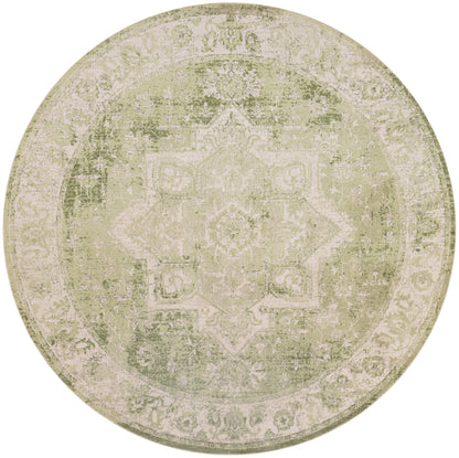 Round distressed oriental rug in beige and sage green with a vintage medallion pattern