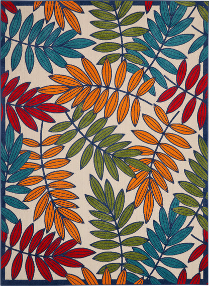 Vibrant tropical leaf rug with orange & teal leaves, green and red accents on beige, framed by a navy border.