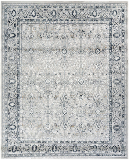 Gray-blue Persian-style area rug with ivory floral medallions & ornate border.