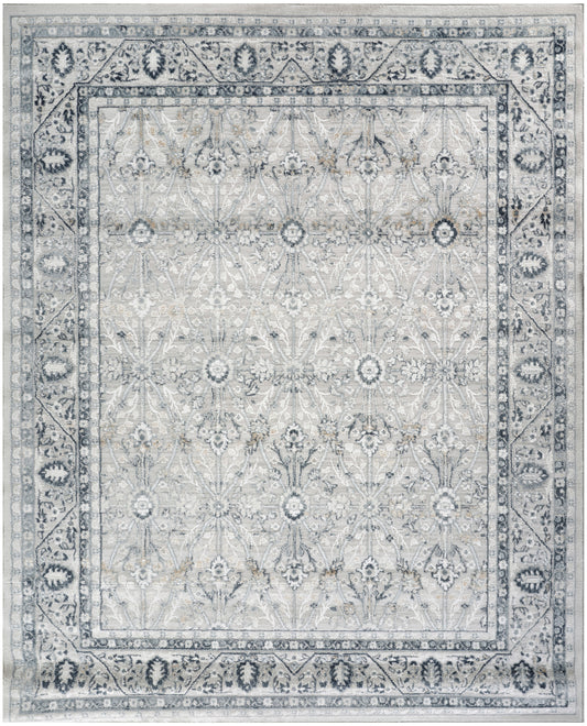 Gray-blue Persian-style area rug with ivory floral medallions & ornate border.