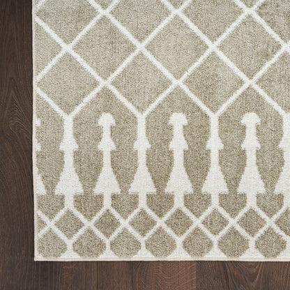 Beige rug with white lattice diamonds and a row of white dress silhouettes along the bottom edge on hardwood floor