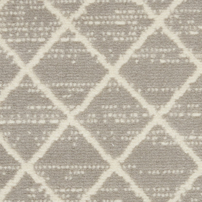 Taupe-gray rug with a cream diamond lattice pattern and woven texture.