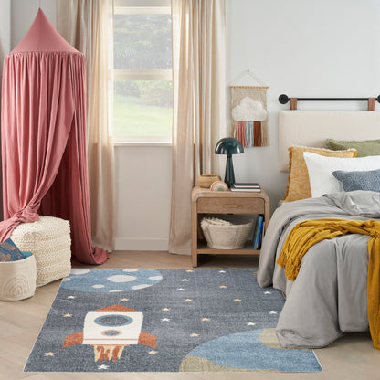 Cozy kids' bedroom with pink canopy, blue space rocket rug, gray bedding, mustard throw, and light wood nightstand.