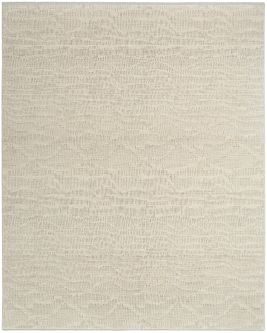 Beige textured area rug with subtle cream wavy pattern and woven surface.
